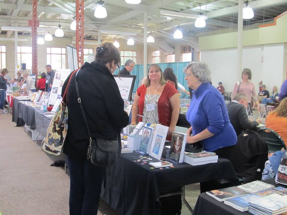 Karen selling her books